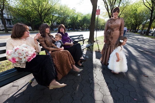 relatives of the bride and groom wait outside the Oholei Torah Center