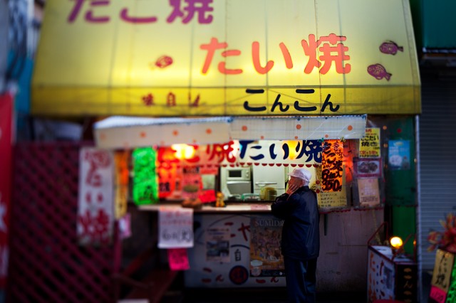 Mr Yamamoto waits for his takoyaki - octopus balls